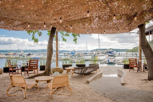 Located at the marina, offering casual bites, cold beers, and signature cocktails with a relaxed, tropical vibe.