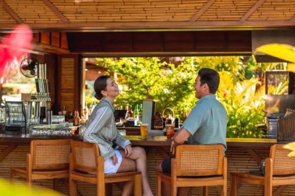 A casual spot near the tennis courts offering refreshing drinks and light bites, perfect for a post-match cool down.